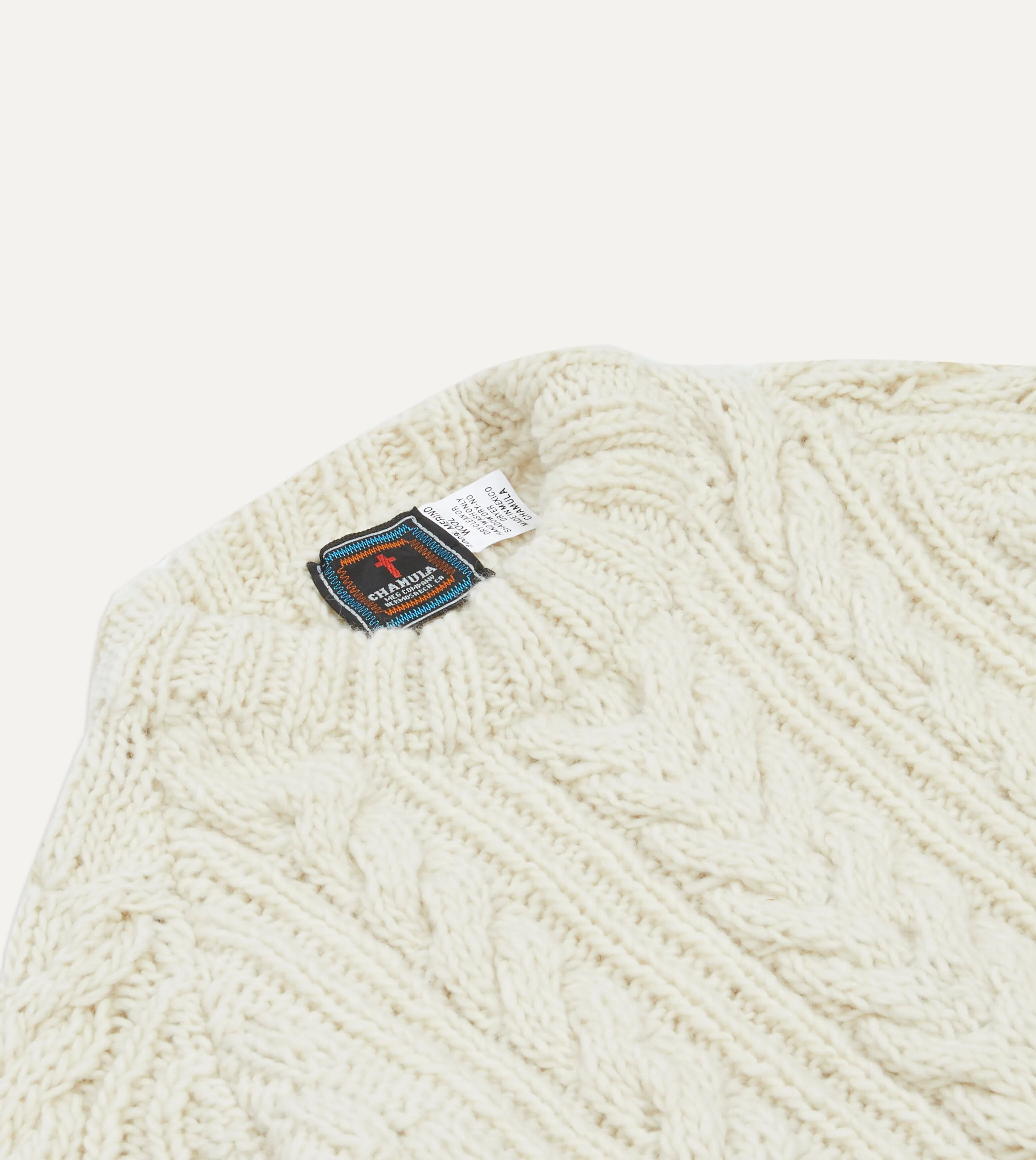 Sure! Here’s an optimized title for the product:

Drakes Ecru Cable Knit Merino Wool Jumper - Luxurious Softness & Classic Style

This title includes modifiers that highlight the products material, color, and key features, making it more appealing to potential buyers.